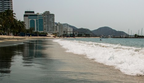 Black mixing with white sand