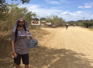 Mark bringing the water jug back