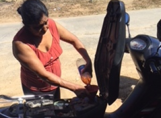 Getting gas in our one day moto rental