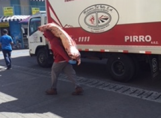 A guy delivering meat