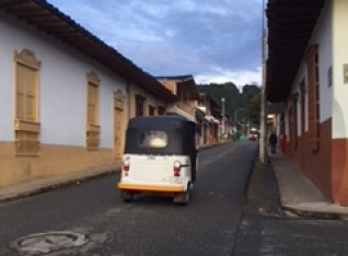 Tuktuk driving by